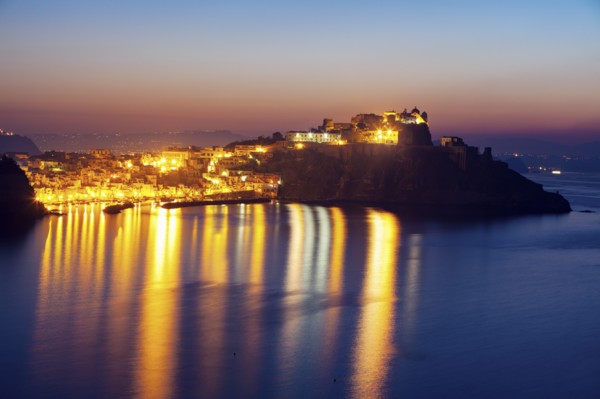 Illuminated townscape on Marina Corricella on Procida Island