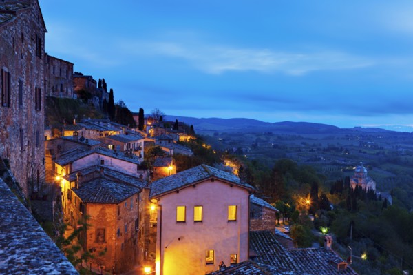 Montepulciano, Illuminated houses on rocks under cloudy sky