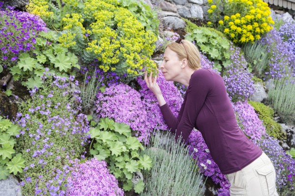 Woman smelling flowers