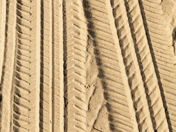Tire tracks in sand