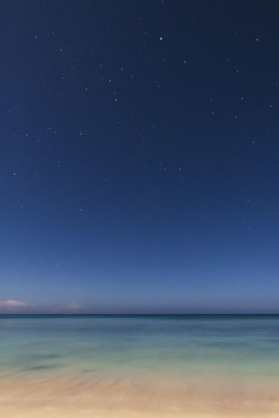 Stars on blue sky over sea