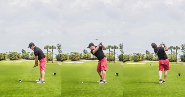 Man hitting ball with golf club