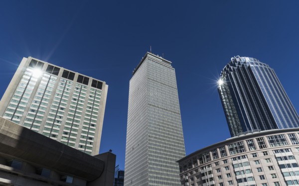 Modern skyscrapers in financial district on sunny day