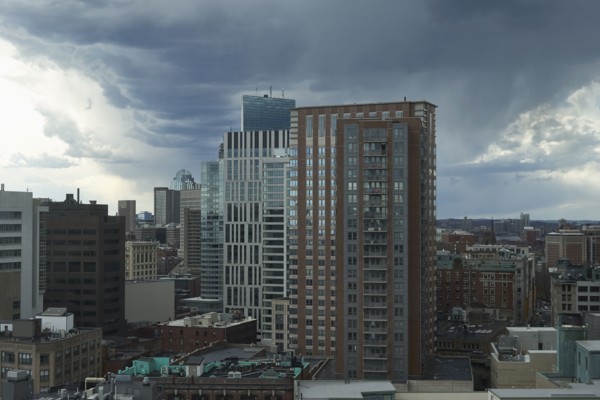 Downtown district against sky