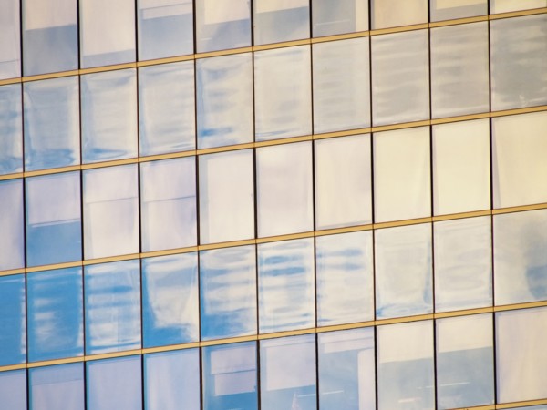 Sunlight reflecting in windows of office building