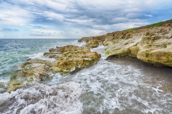 Cloudy sky over coastline