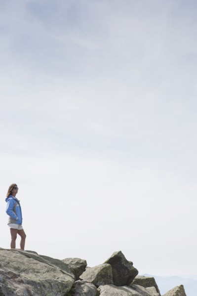 Woman standing on rocks