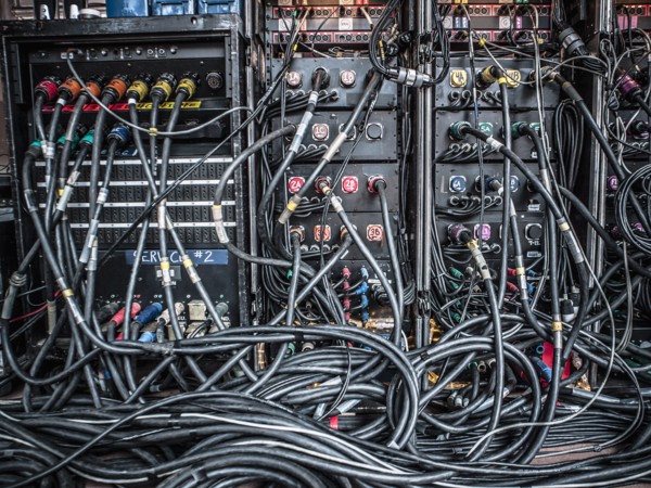 Rear view of audio amplifiers and cables