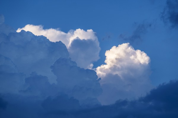 Cumulus clouds on sky.
