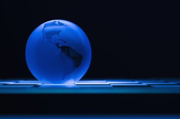 Globe on chess board.
