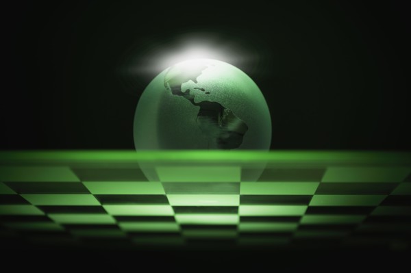 Globe on chess board.