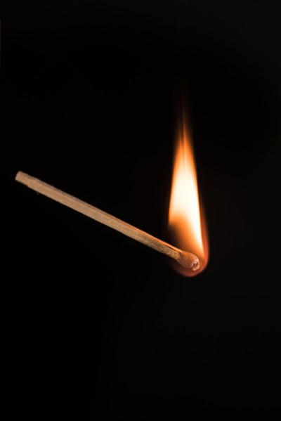 Studio shot of burning match.