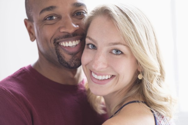 Portrait of happy multi ethnic couple.