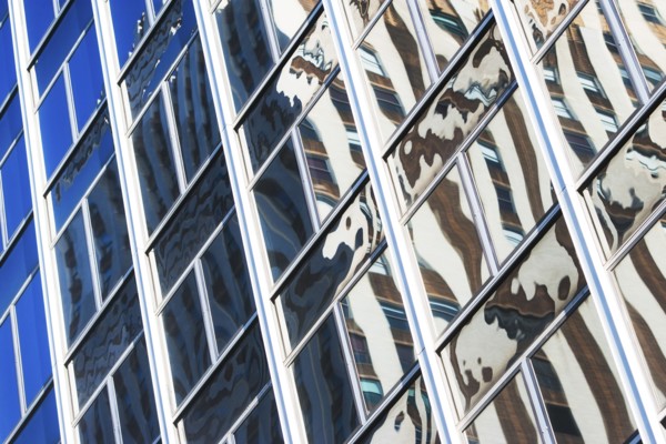 USA, New York State, New York City, Glass facade of skyscraper