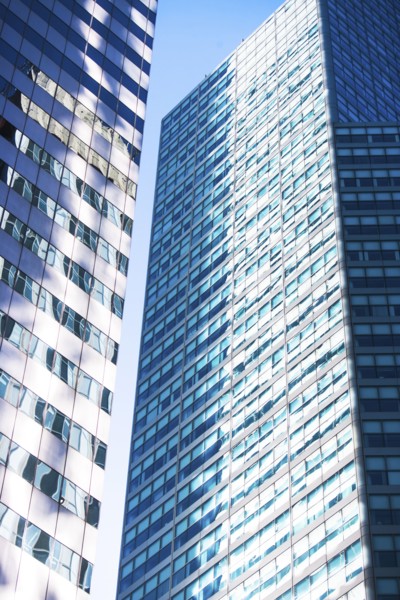USA, New York, New York City, Glass facade of office buildings