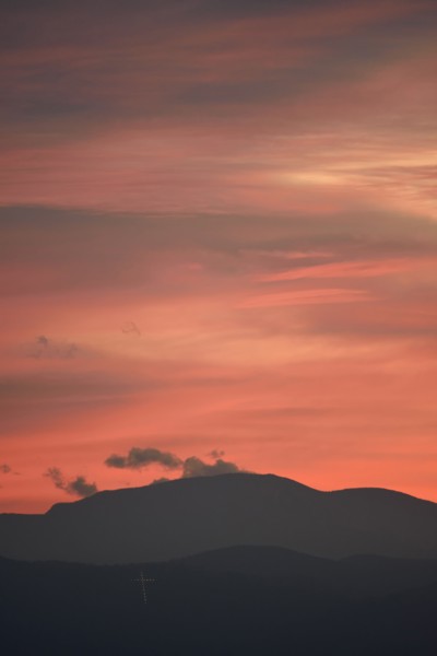 USA, Colorado, Denver, Colorful sky over mountain range