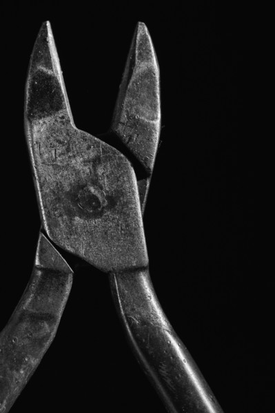 Hand tool against black background