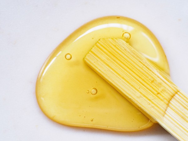 Honey and wooden stick