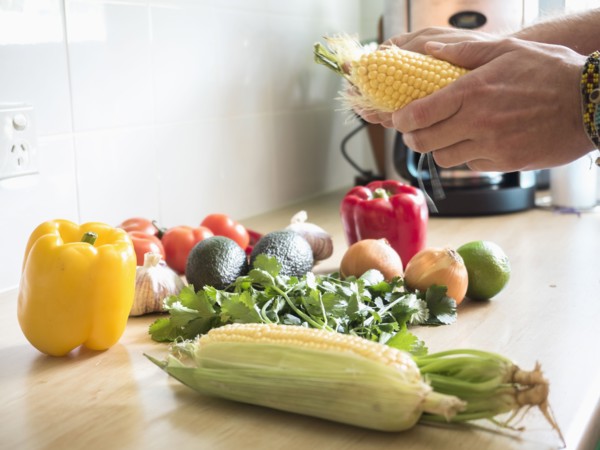 Corn and vegetables on table