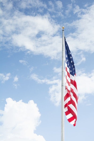 American flag against blue sky