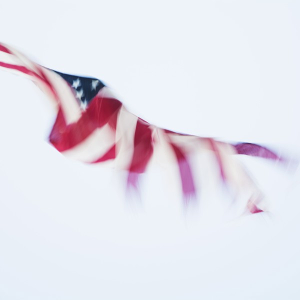 Blurred american flag against white background