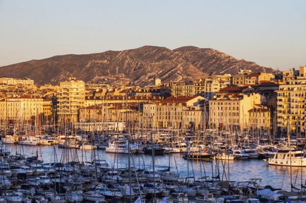 France, Provence-Alpes-Cote d'Azur, Marseille, Vieux port - Old Port with mountain in background