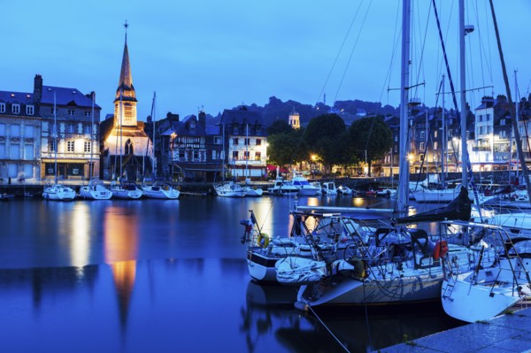 France, Normandy, Honfleur, Boats in harbor and Saint-Etiennei Church in distance