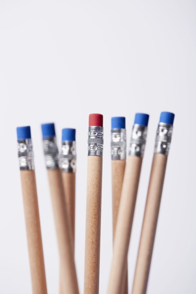 Wooden pencils, one with red eraser