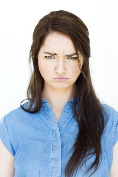 Portrait of woman making sad expression