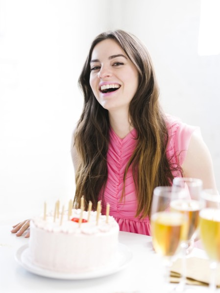 Portrait of woman at birthday party