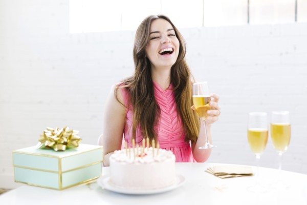 Portrait of woman at birthday party