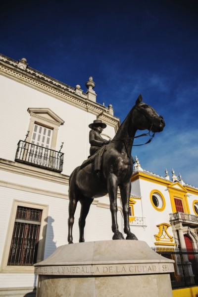 Spain, Seville, Equestrian statue of Augusta Senora Condesa de Barcelona in front of Plaza de Toros