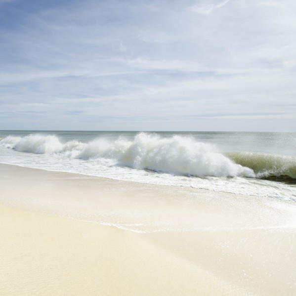 Sandy beach with waves