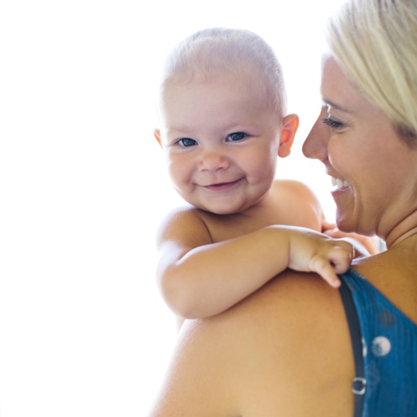 Mother holding baby boy (18-23 months)