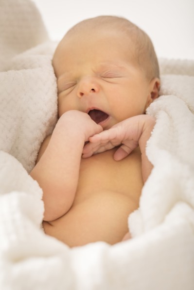 Baby boy (0-1 months) yawning