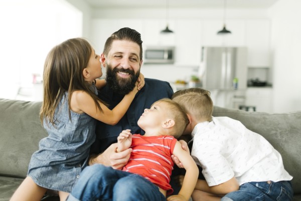Father playing with three children (2-3, 6-7)