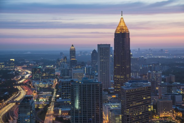 USA, Georgia, Atlanta, Cityscape with skyscrapers at dawn
