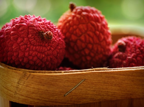 Red lychee in basket