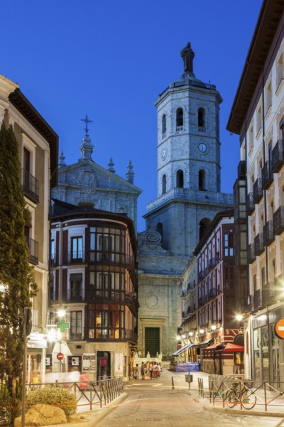 Spain, Castile and Leon, Valladolid, City street with Cathedral of Valladolid in background
