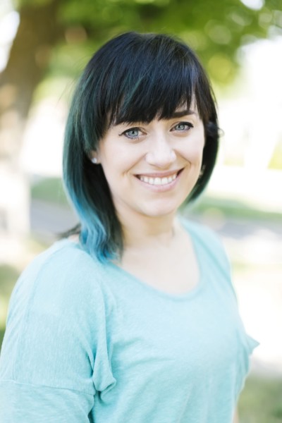 Portrait of smiling woman with blue ombre hair