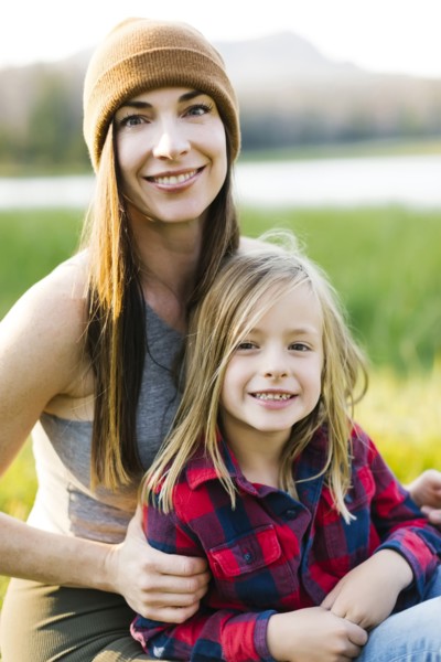 Portrait of mother and son (6-7) in meadow