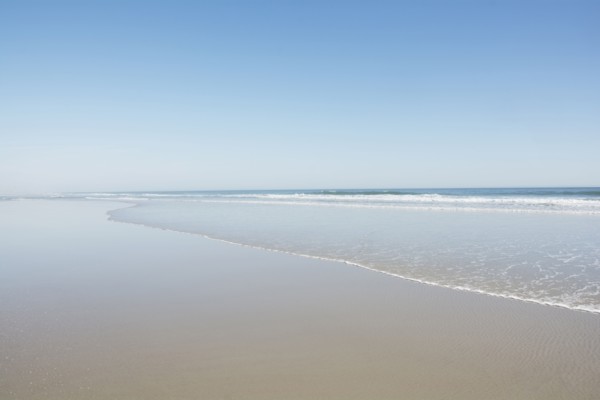 Empty beach on sunny day