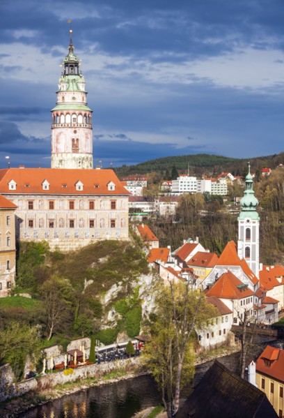 Czech Republic, South Bohemia, Cesky Krumlov, Castle against storm clouds