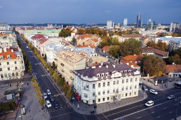 Lithuania, Vilnius, Old architecture of town with skyscrapers in background