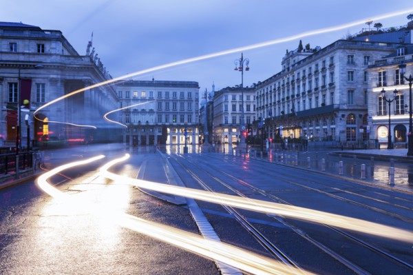 France, Nouvelle-Aquitaine, Bordeaux, City street at dusk