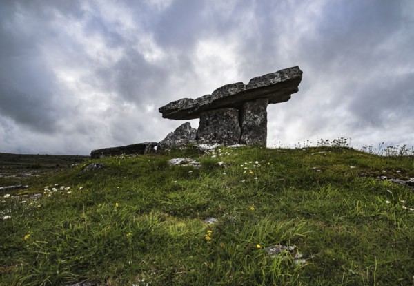 Ireland, Clare County, Burren, Poulnabrone Dolmen under overcast sky