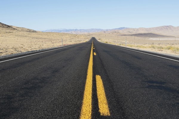 USA, Nevada, Highway 50, Clear sky over empty road