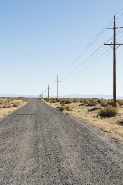 USA, Nevada, Highway 50, Electricity pylons next to road