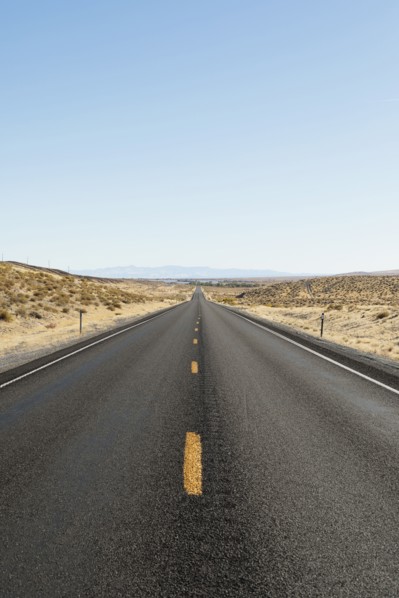 USA, Nevada, Highway 50, Clear sky over empty road