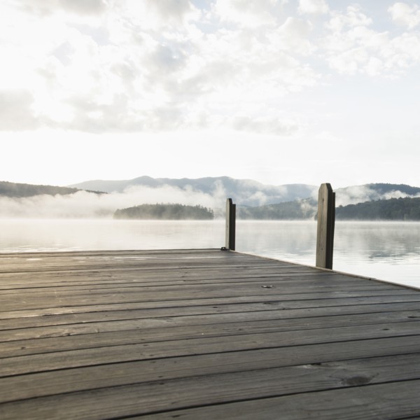 USA, New York, Lake Placid, Pier with foggy lake in background